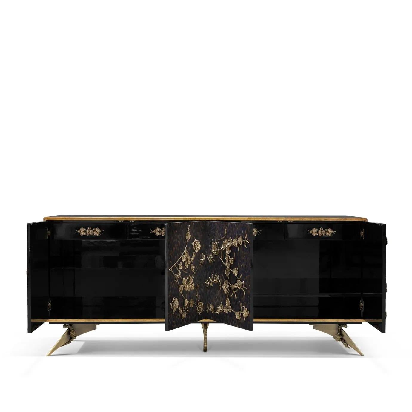 There is a sense of reveal and conceal as KOKET takes a beautiful chest in high gloss lacquer and adorns it in metal organic lace, revealing a mesmerizing hint of what lies beneath. Interior opens to four drawers embellished with organic hardware