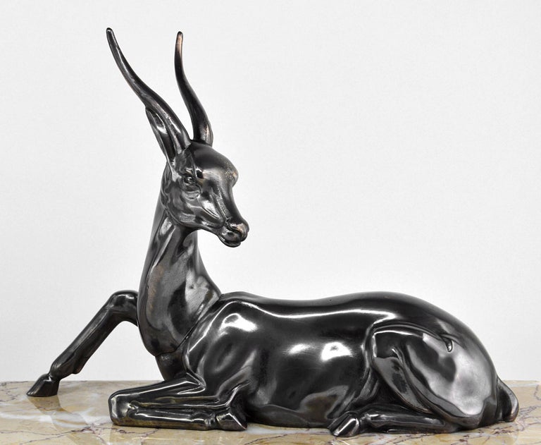 Antelope sculpture, France, 1930s. Spelter, marble and onyx. Measures: width 17.7