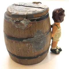 Spelter Still Bank "Girl By A Barrel", German, circa 1908