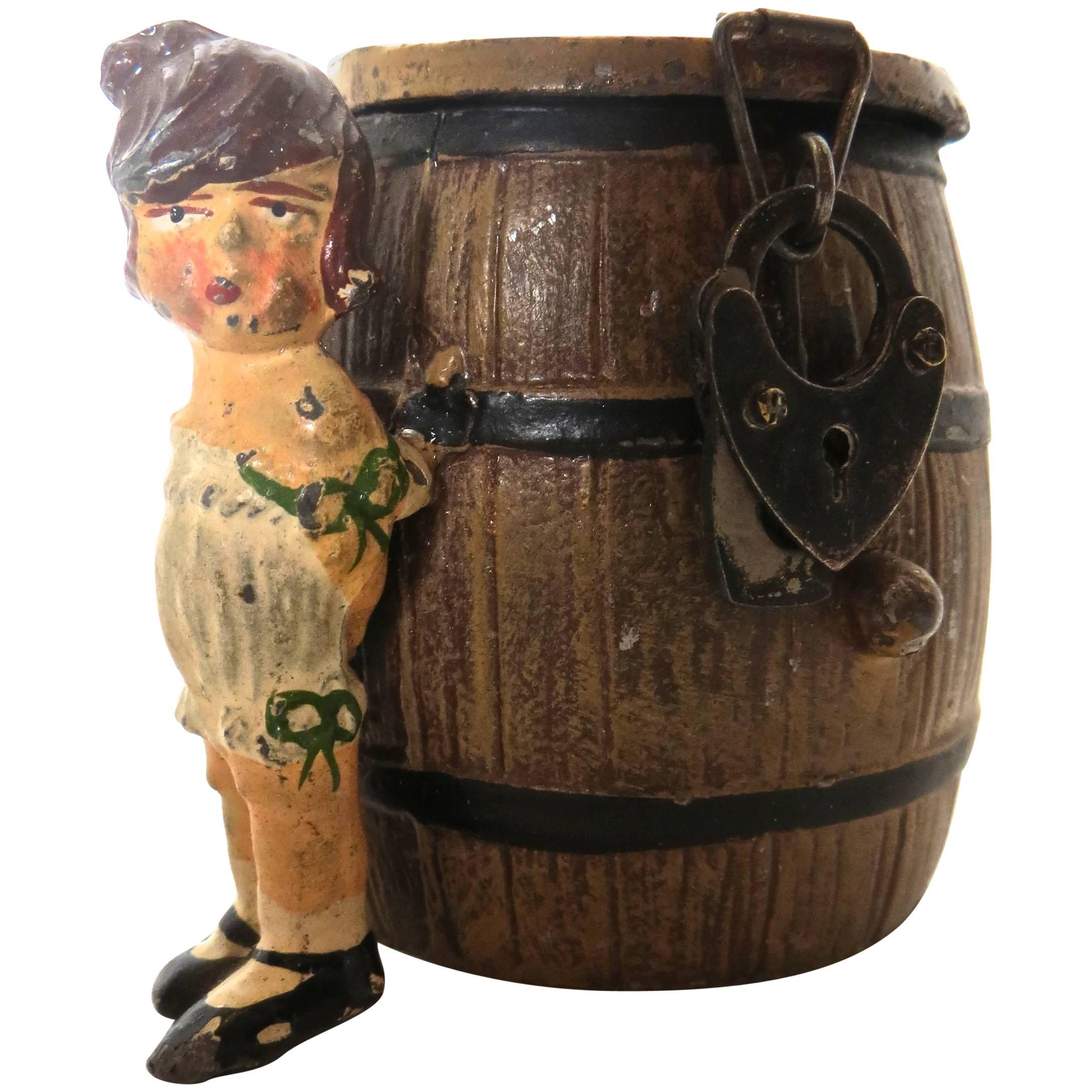Spelter Still Bank "Girl By A Barrel", German, circa 1908