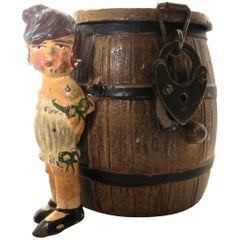 Antique Spelter Still Bank "Girl By A Barrel", German, circa 1908