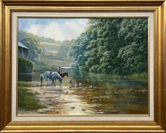 Cavallo e famiglia con anatre e cane in riva al fiume nella campagna inglese