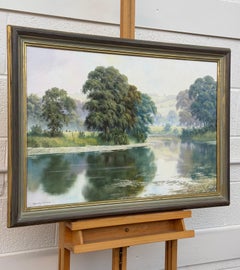 Peaceful Misty Riverside in the English Countryside with Cows & Tree Reflections