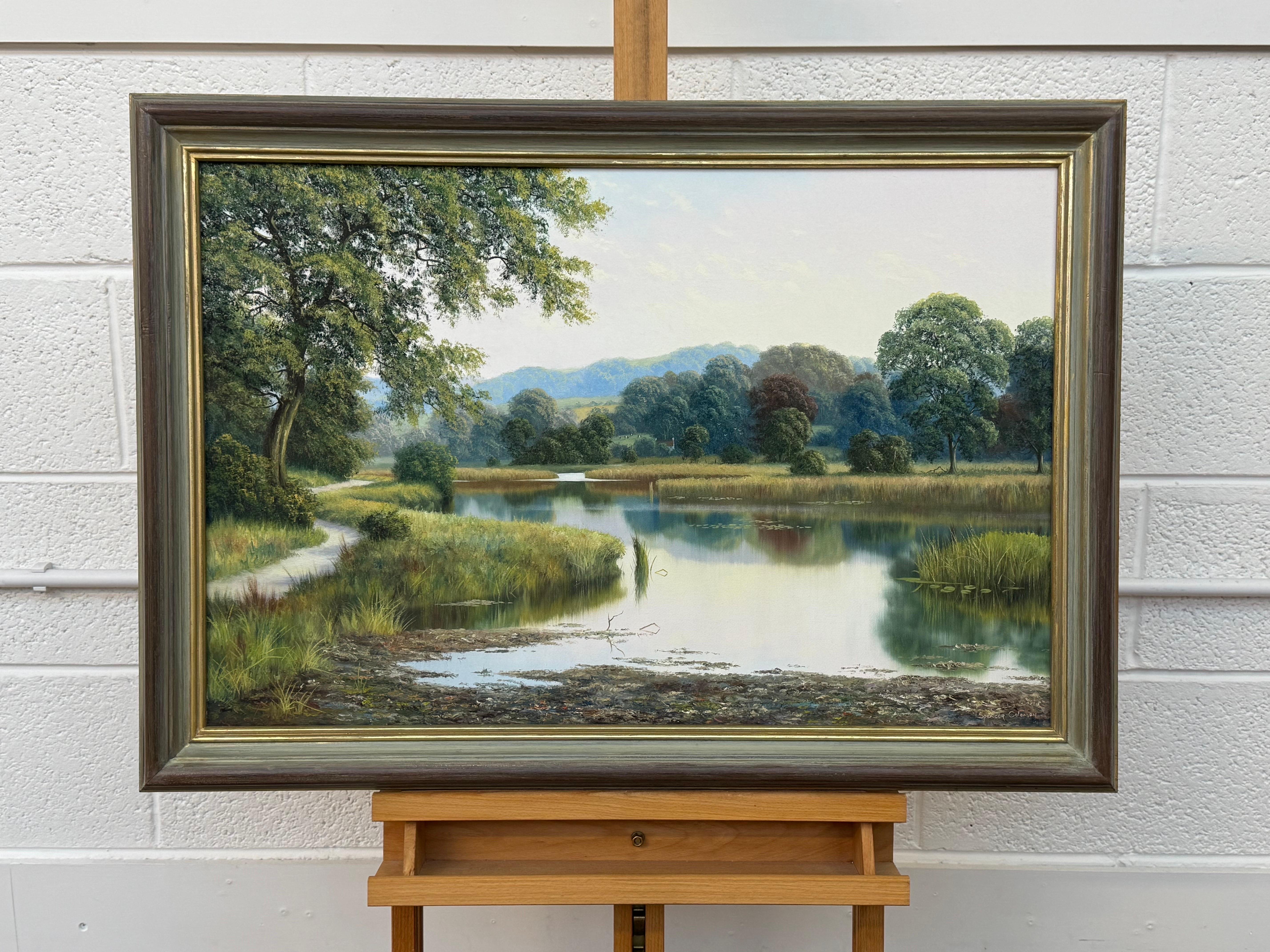 Serena Escena Fluvial con Cabaña y Vacas en los Campos de la Campiña Inglesa - Painting de Spencer Coleman