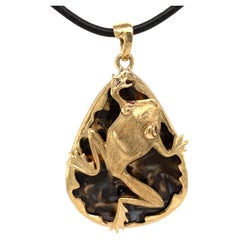 "Spenser the Frog" Pendant in Yellow Gold with Ruby Eyes on Graphic Stick Agate