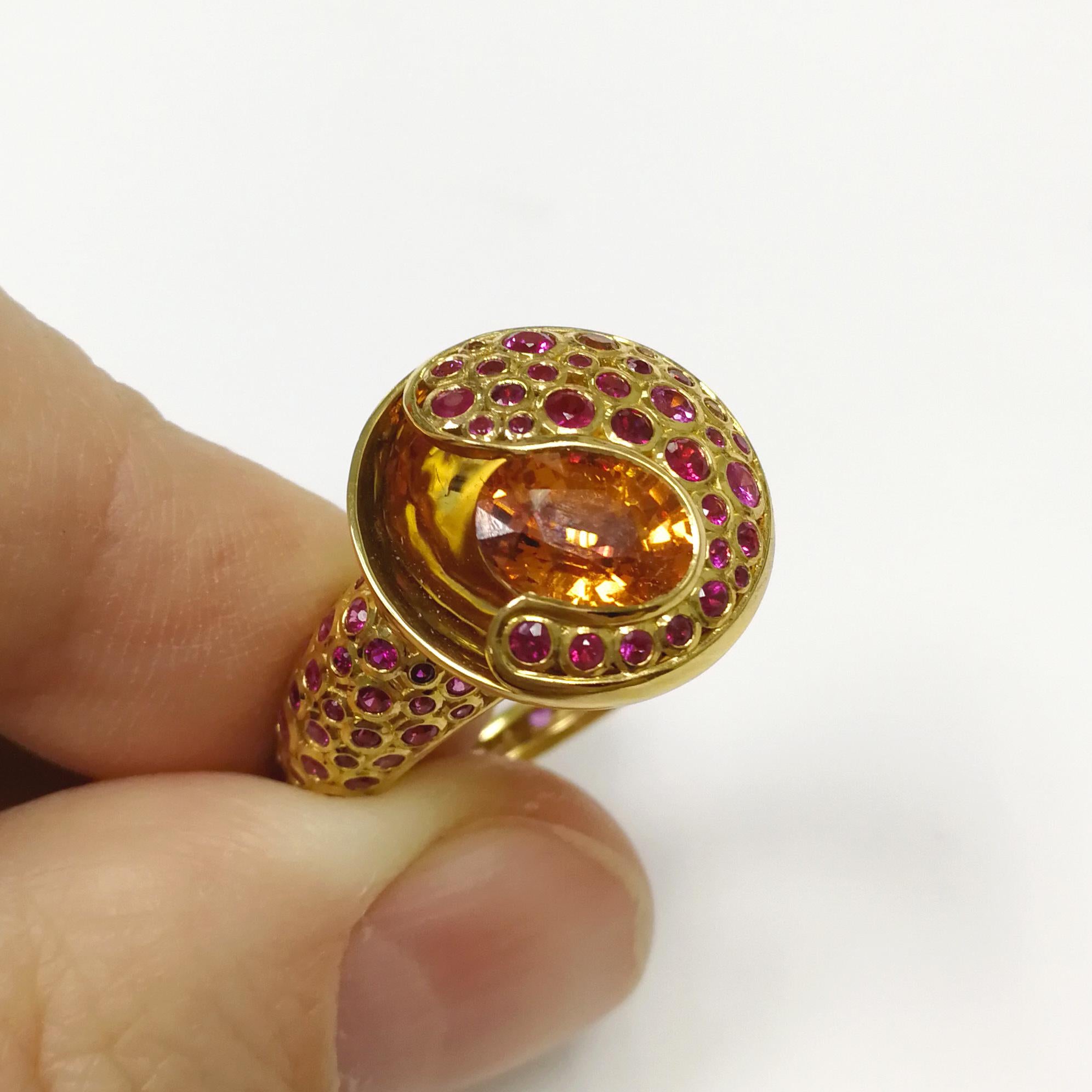 Spessartine 1.75 Carat Ruby Sapphire 18 Karat Yellow Gold Bubble Ring
Incredibly light and airy Ring from our Bubbles Collection. Yellow 18 Karat Gold is made in the form of variety of small bubbles, some of which have 82 Rubies and 64 Pink and