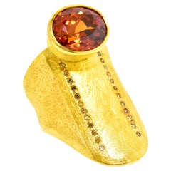 Spessartite Garnet, 10.19 Cts. & Colored Diamond 18K Ring, Atelier Zobel, 2002