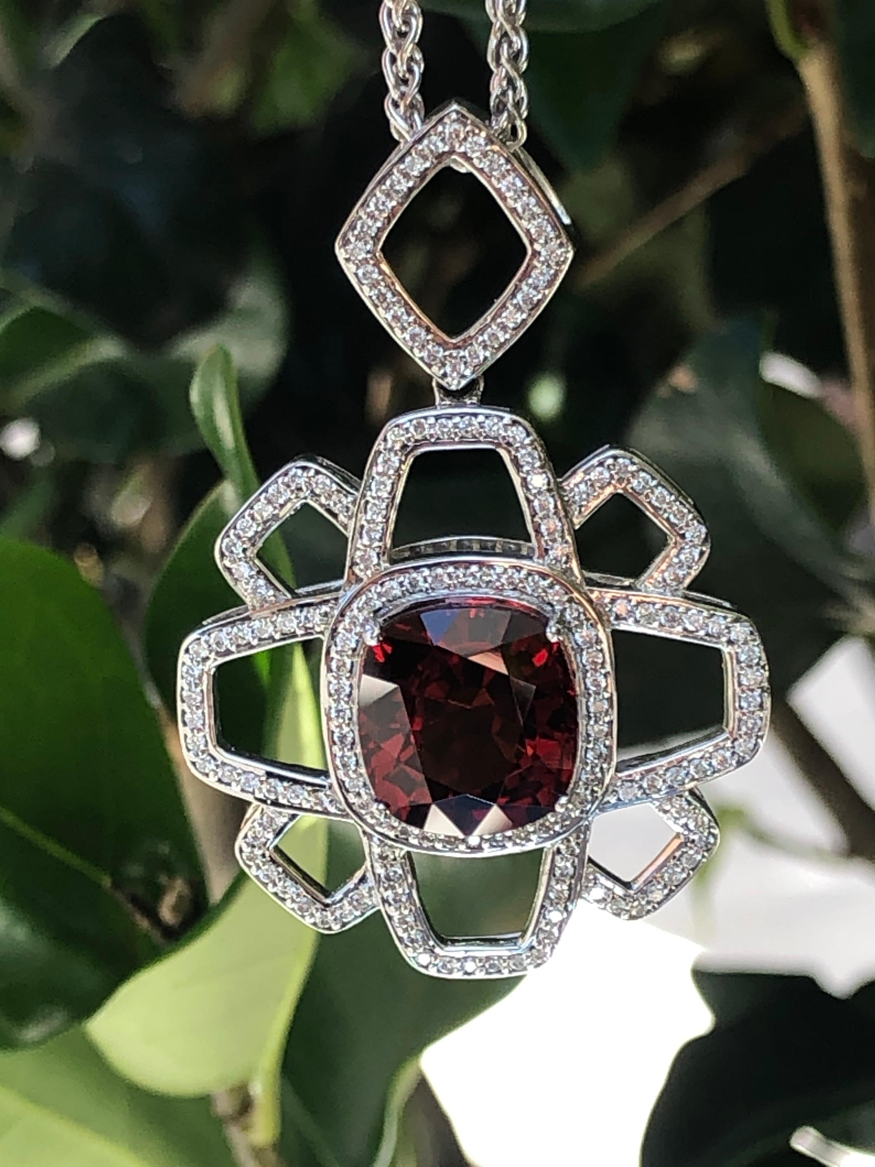 8.31 Carat Spessartite Garnet Pendant Necklace - Tamir By Merkaba Beverly Hills.

Experience the epitome of luxury jewelry with this stunning 8.31-carat cushion-cut Spessartite Garnet pendant necklace, a timeless piece of fine jewelry crafted with