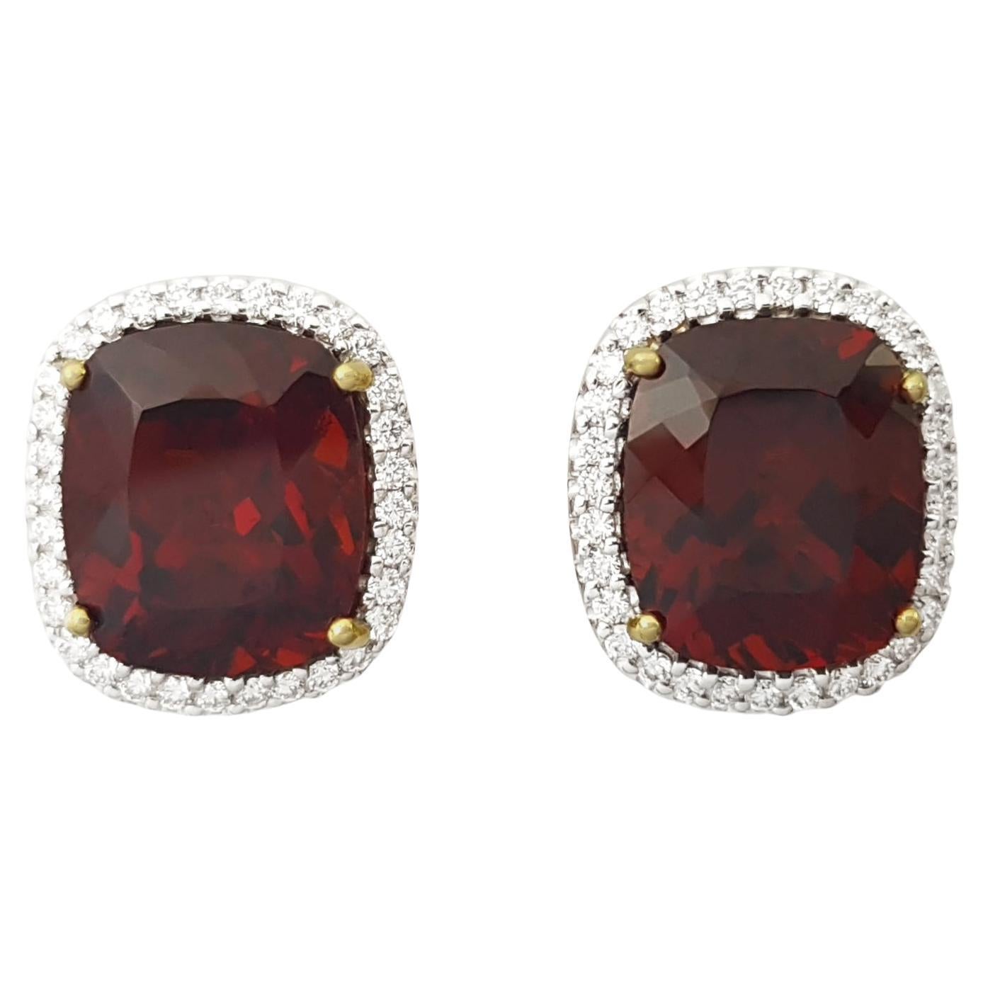 Orecchini con granato spessartite e diamanti con montatura in oro 18K