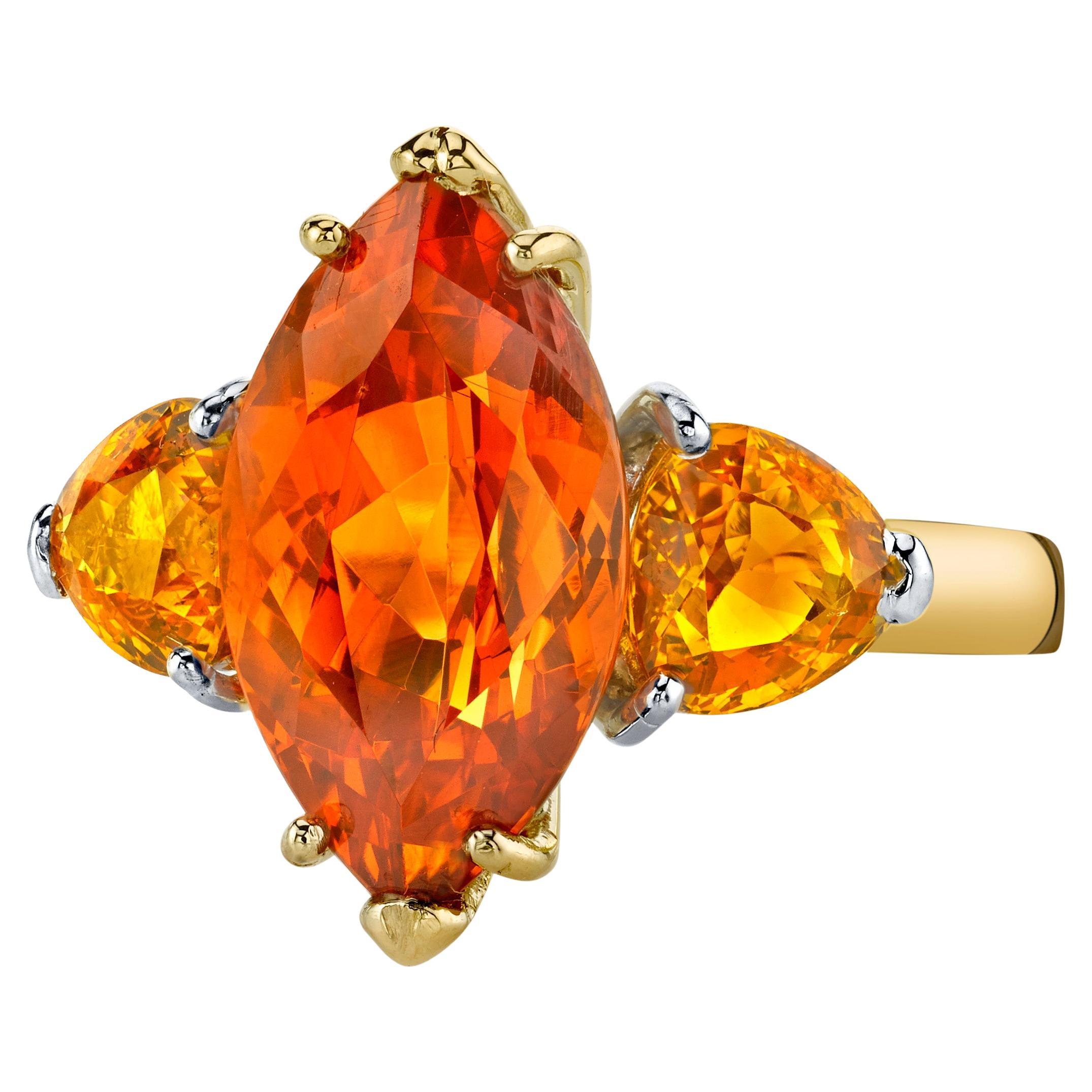 Spessartite Mandarin Garnet and Yellow Sapphire Three-Stone Ring in Yellow Gold