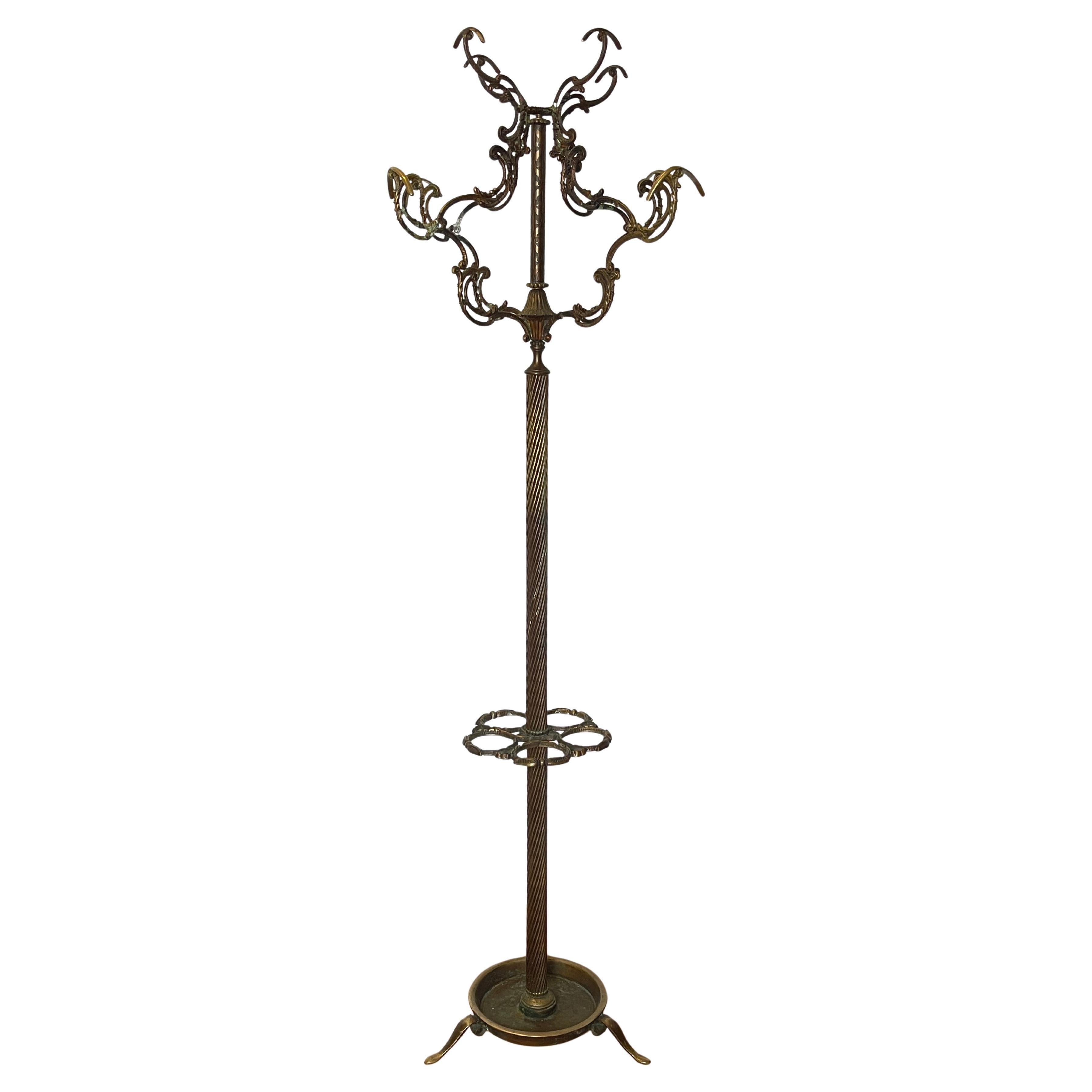 Spectacular forged bronze coat rack with elegant details For Sale