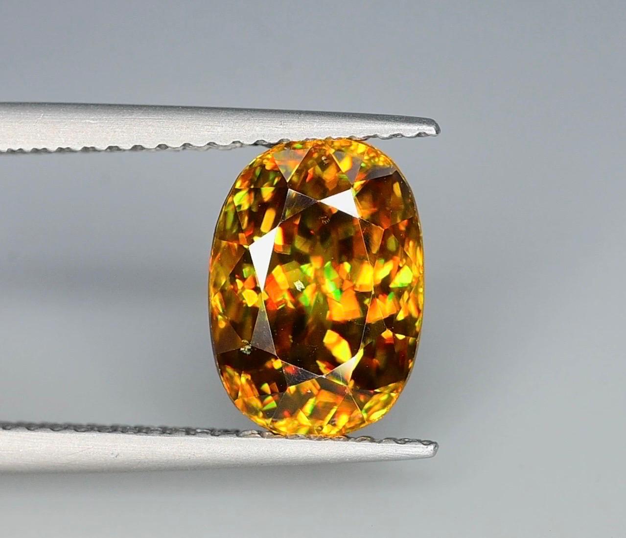 Introducing a stunning 4.15 carat sphene titanite, a rare gem exuding captivating brilliance. Elevate your jewelry collection with its unique play of colors and exceptional clarity. Limited availability, seize the opportunity to own a true natural