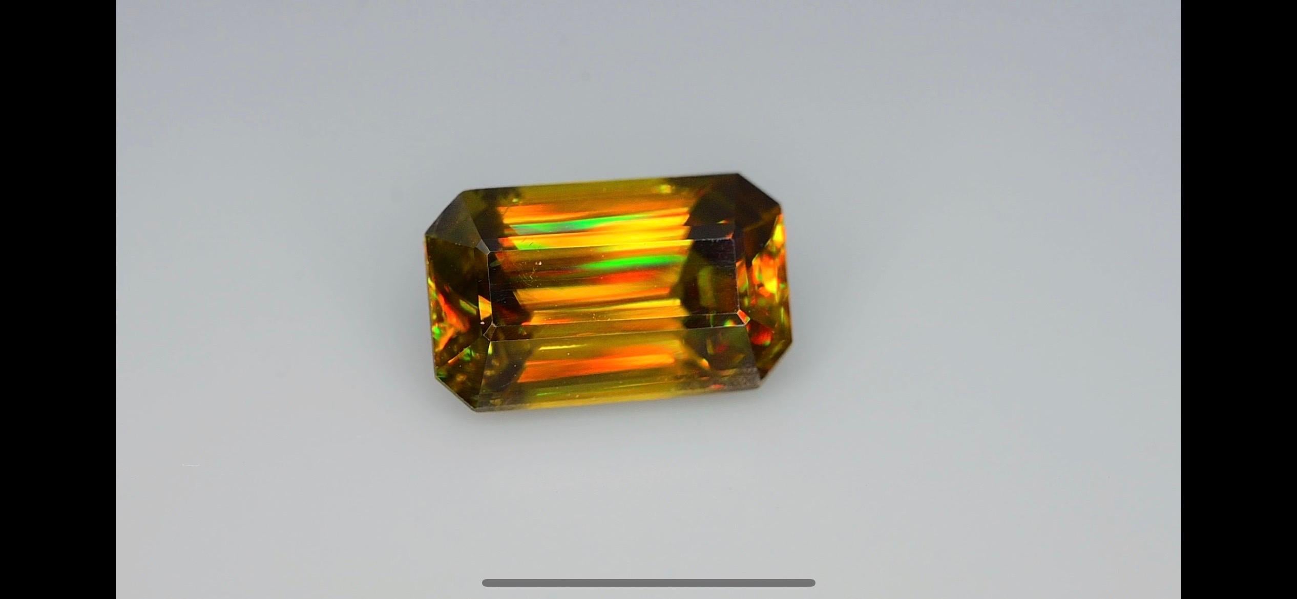 Introducing a stunning Sphene Titanite: 4.55 carat beauty. Its fiery brilliance is a sight to behold. Adorn yourself with this exquisite gem, a true testament to nature’s artistry. Available now for those who appreciate the