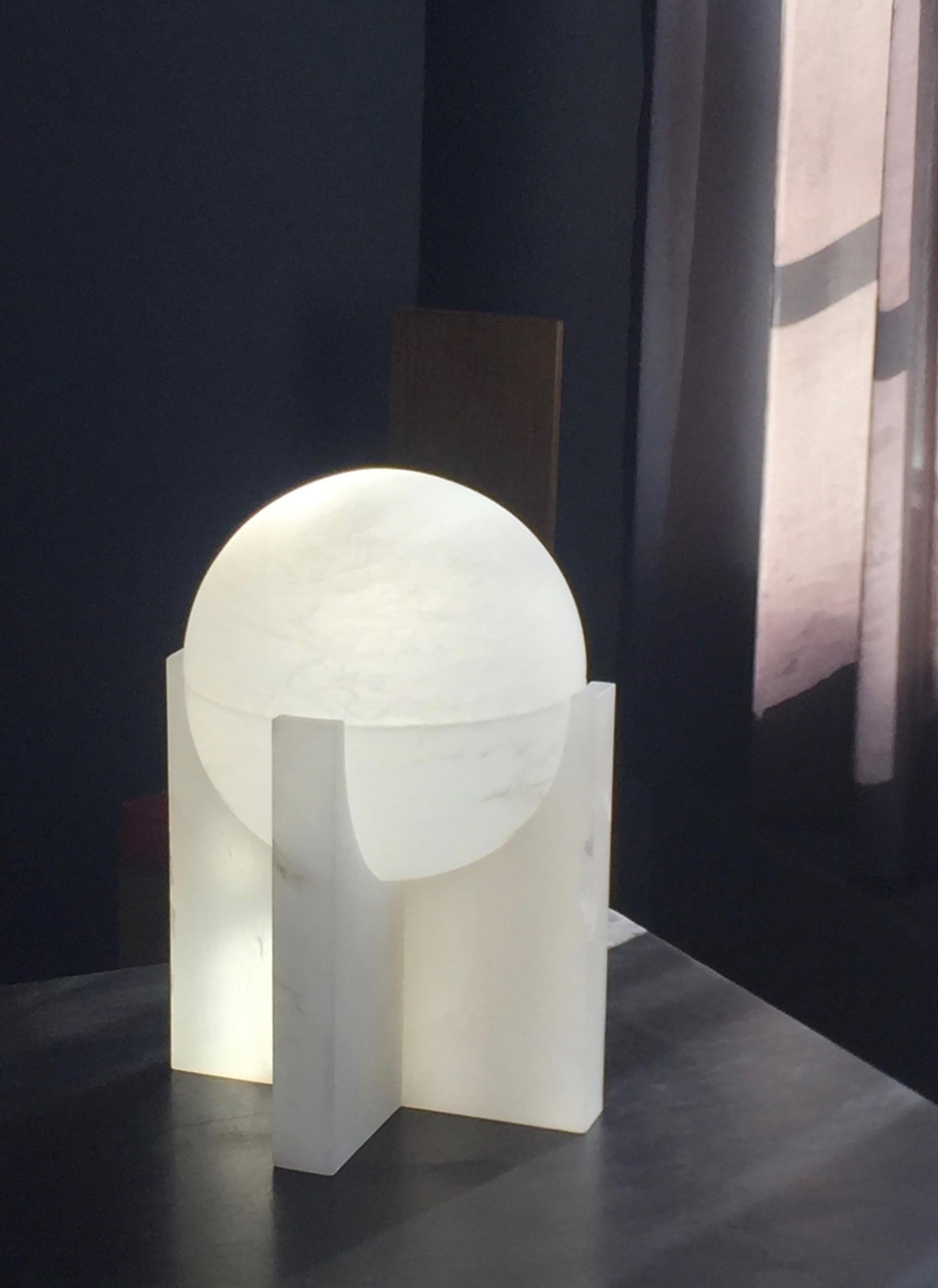 'Sphere' Alabaster table lamp in the manner of Pierre Chareau. Handcrafted in Los Angeles in the workshop of noted French designer and antiques dealer Denis de le Mesiere, who meticulously pays homage to the work of Pierre Chareau with scrupulous