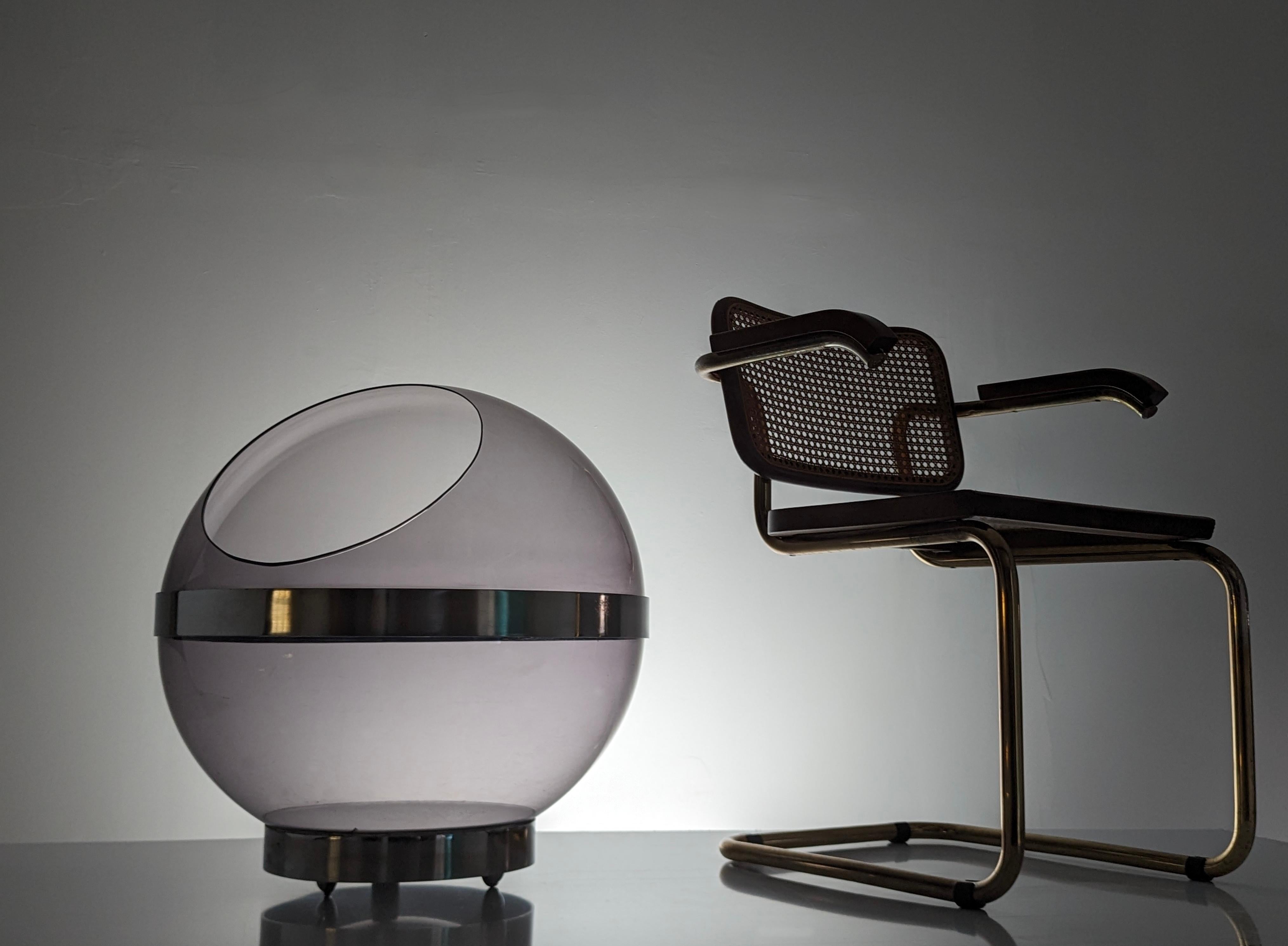 Sphere bar furniture designed by Boris Tabacoff Edition 'Mobilier Modulaire Moderne', 1971. Made of smoked acrylic glass shell, chromed steel, and base with swivel wheels.