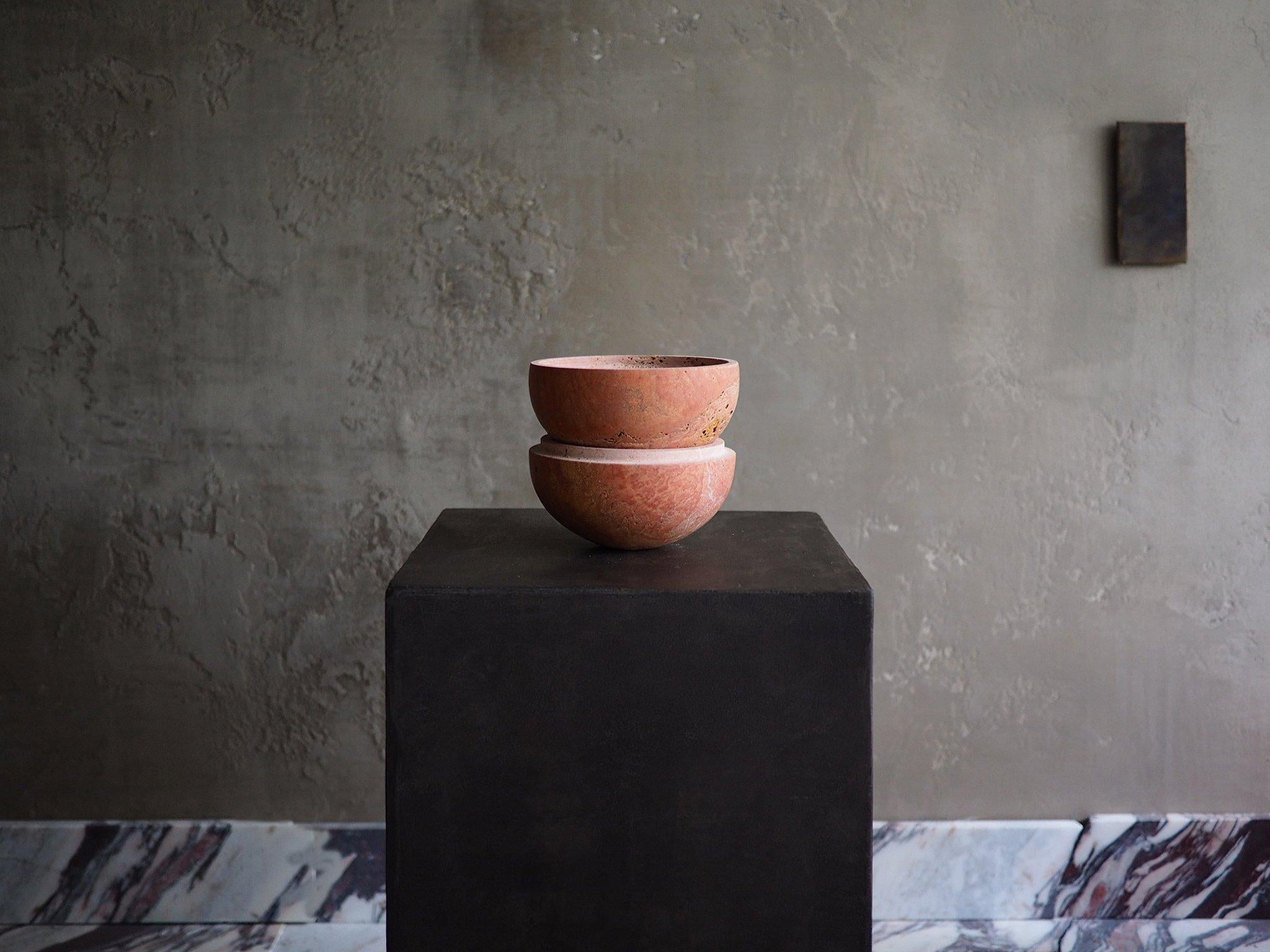 Sculpted from solid blocks of unfilled beige travertine, sphere incense censer by Brendan Tadler. Minimalist in form, the Sphere Censer acts as a quiet object to stimulate creativity and focus when activated with incense or sage. Inside the sphere,