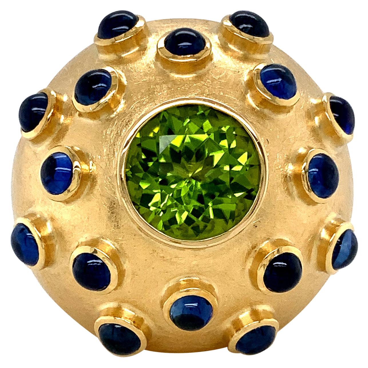 Georg Spreng - Sphere Ball Ring 18K Yellow Gold Green Peridot 16 Blue Sapphires For Sale
