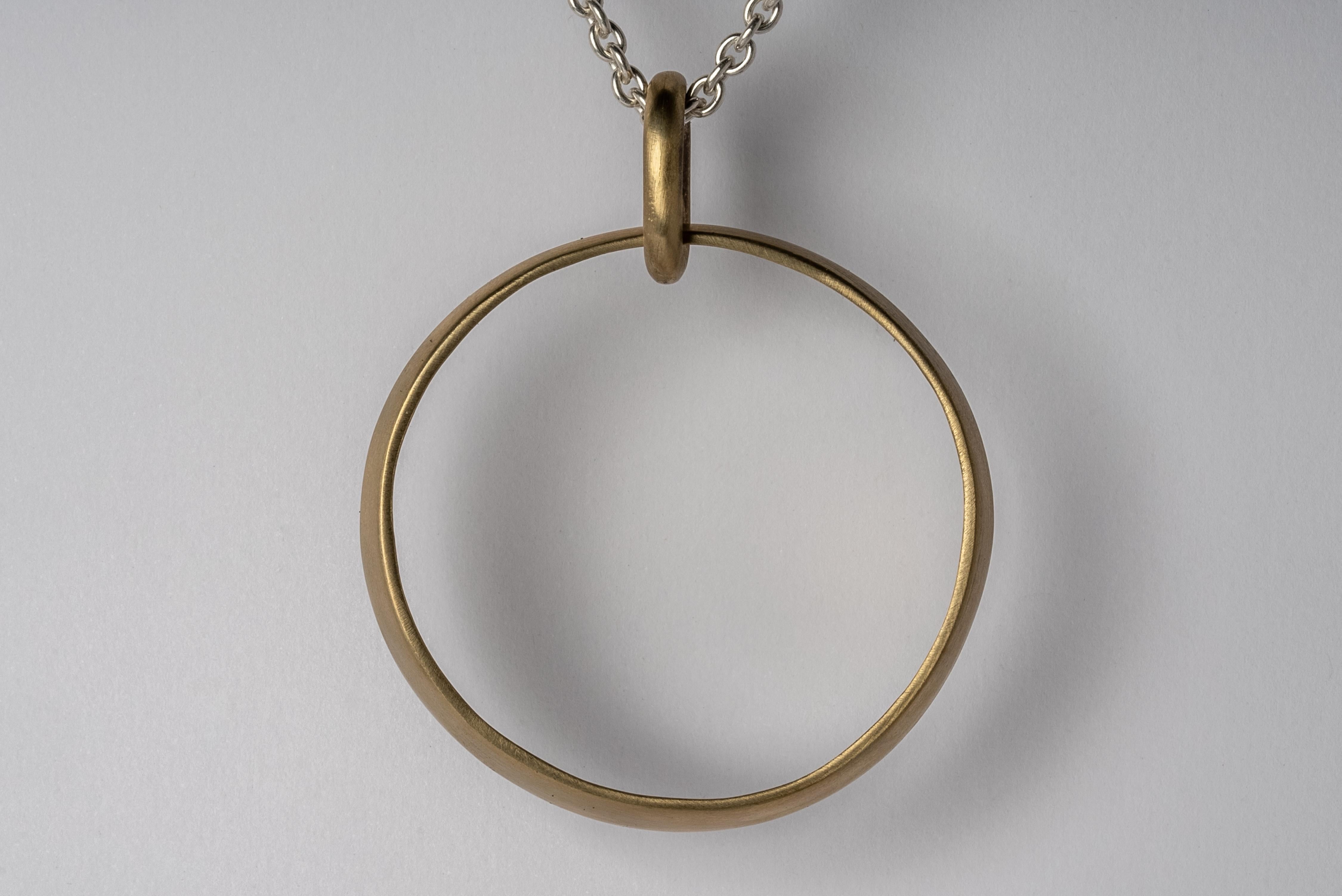 Pendant necklace in the shape of sphere in brass, it comes on a 74cm sterling silver chain.