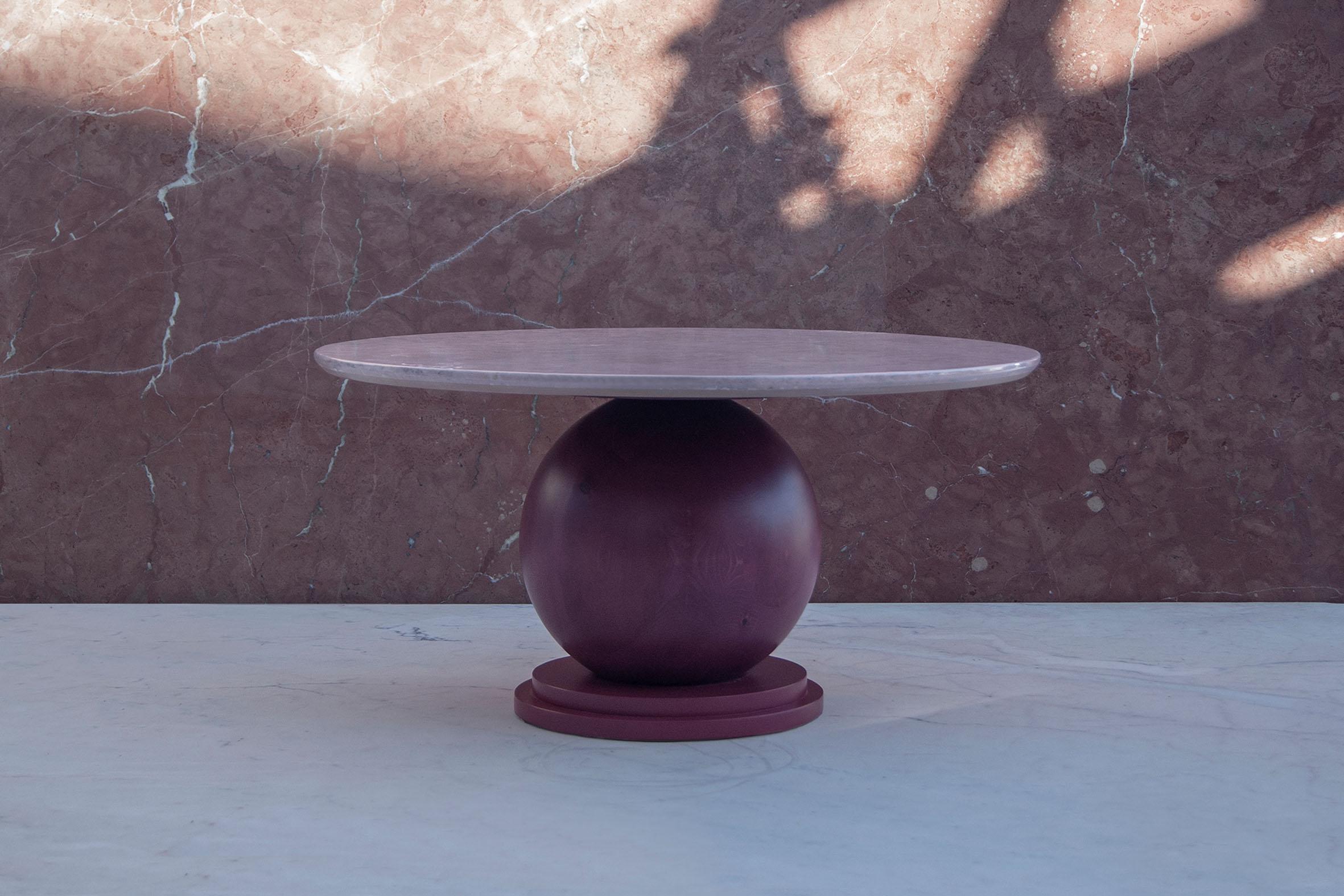 Sphere table by Studio Christinekalia
Dimensions: W 70 x D 70 x H 35 cm.
Materials: Wood, burl veneer.

Derived from the element of the sphere, this low wooden table piece plays with the idea of homogeneity in 360°. The piece combines three
