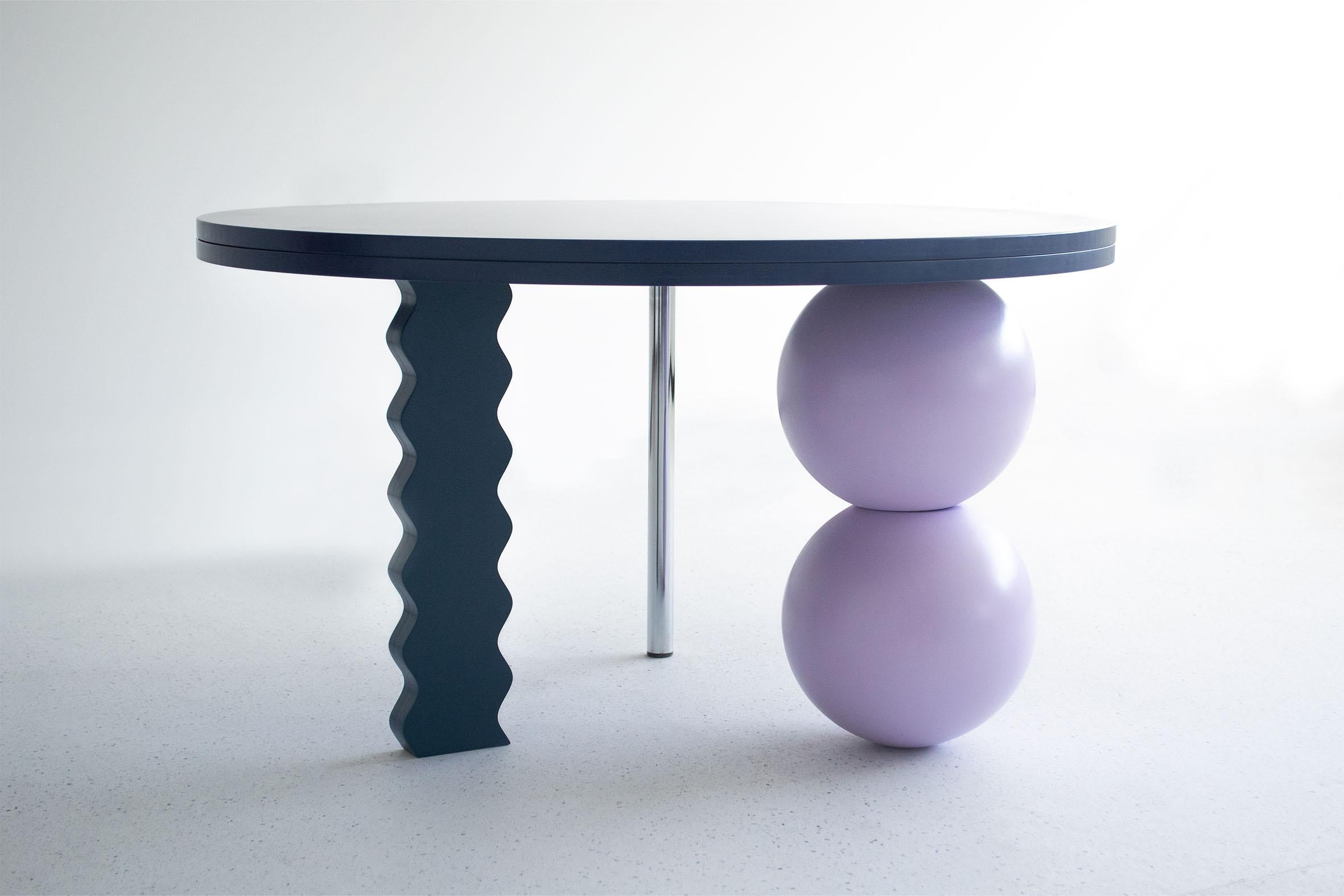 Sphere & wave side table by Studio Christinekalia
Dimensions: W 90 x D 90 x H 50 cm.
Materials: Swedish pine solid Wood, MDF, stainless steel. 

The bold design of this side table makes it a stand-out piece in the space. Combining the