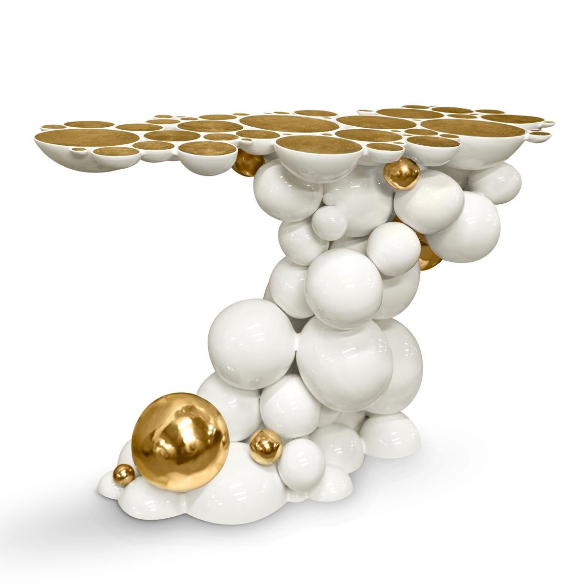 Console table spheres composed by metallic spheres
and semi spheres joined together. Aluminium white varnish
and gold finish.
Also available in Black finish.