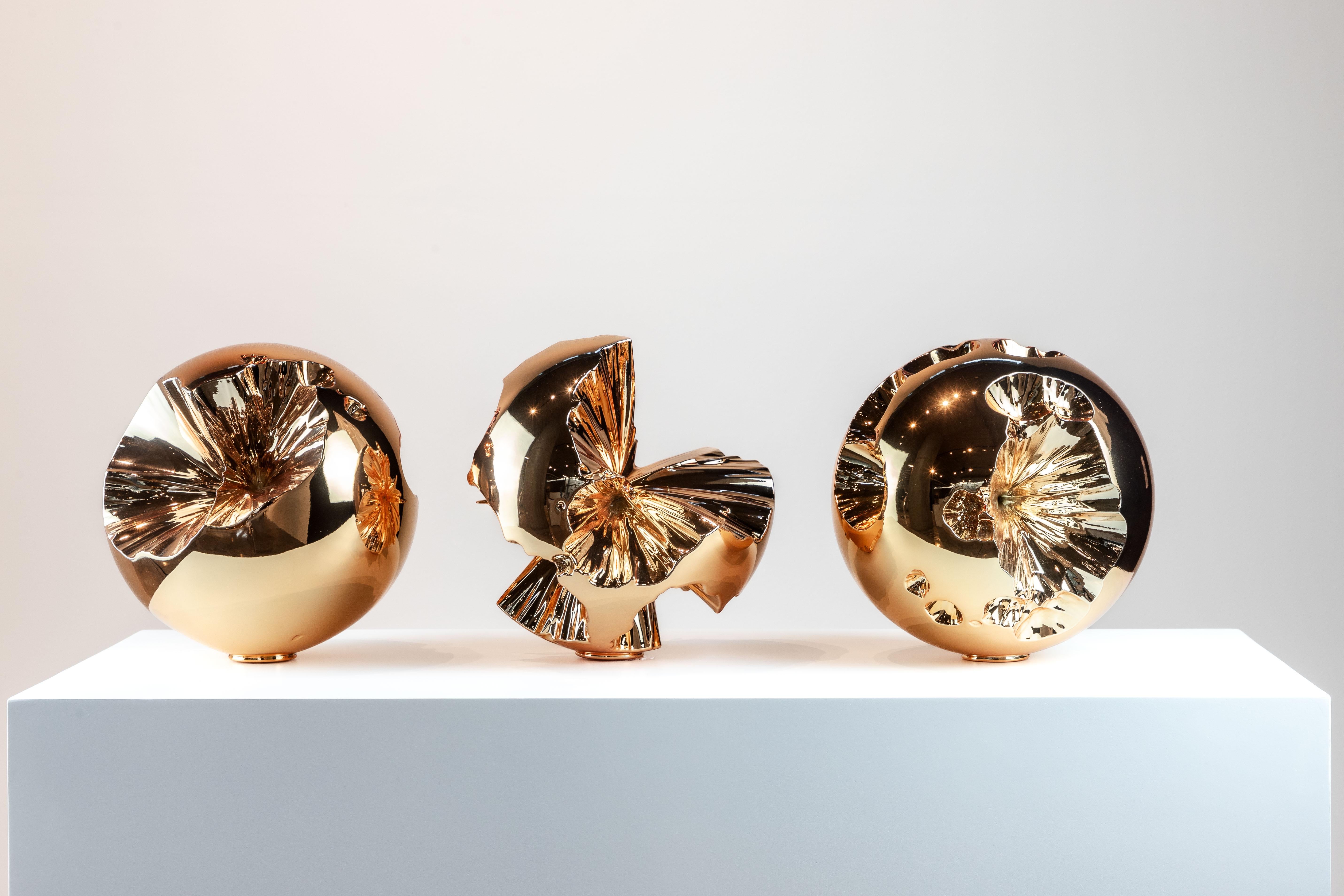 The Sphera sculptures from the Erosia Collection are a breathtaking trio that embody the beauty of transformation and the impermanence of form. Crafted from high-strength resin and finished with a lustrous layer of silver chrome, each sphere is then