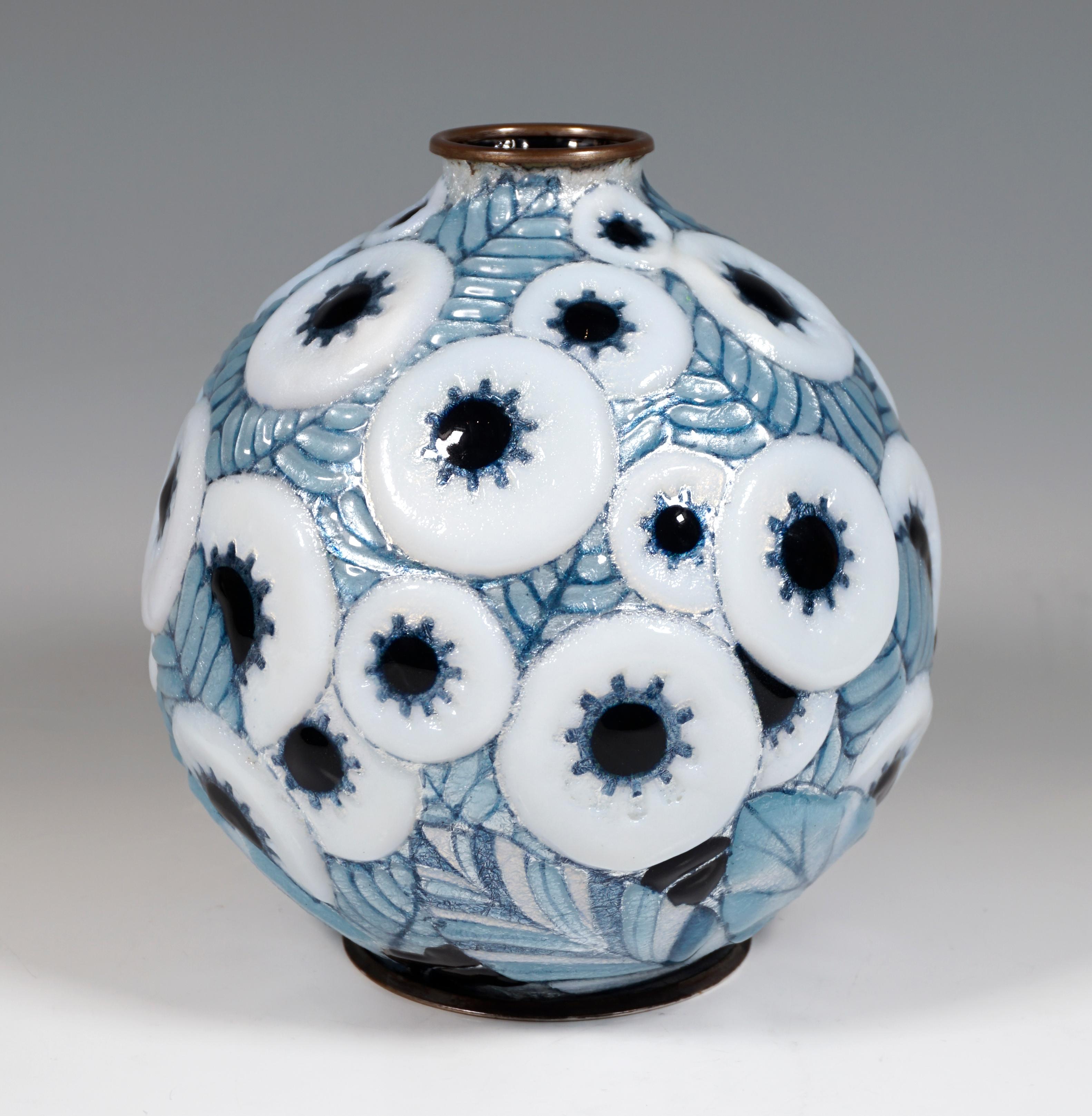 Spherical vessel on a round, grooved metal stand, coated in silver and with pasty applied, polychrome and iridescent geometric-floral enamel decoration in white and blue tones, irregularly glazed, inscribed 'C. FAURÉ LIMOGES.' on the inside of the