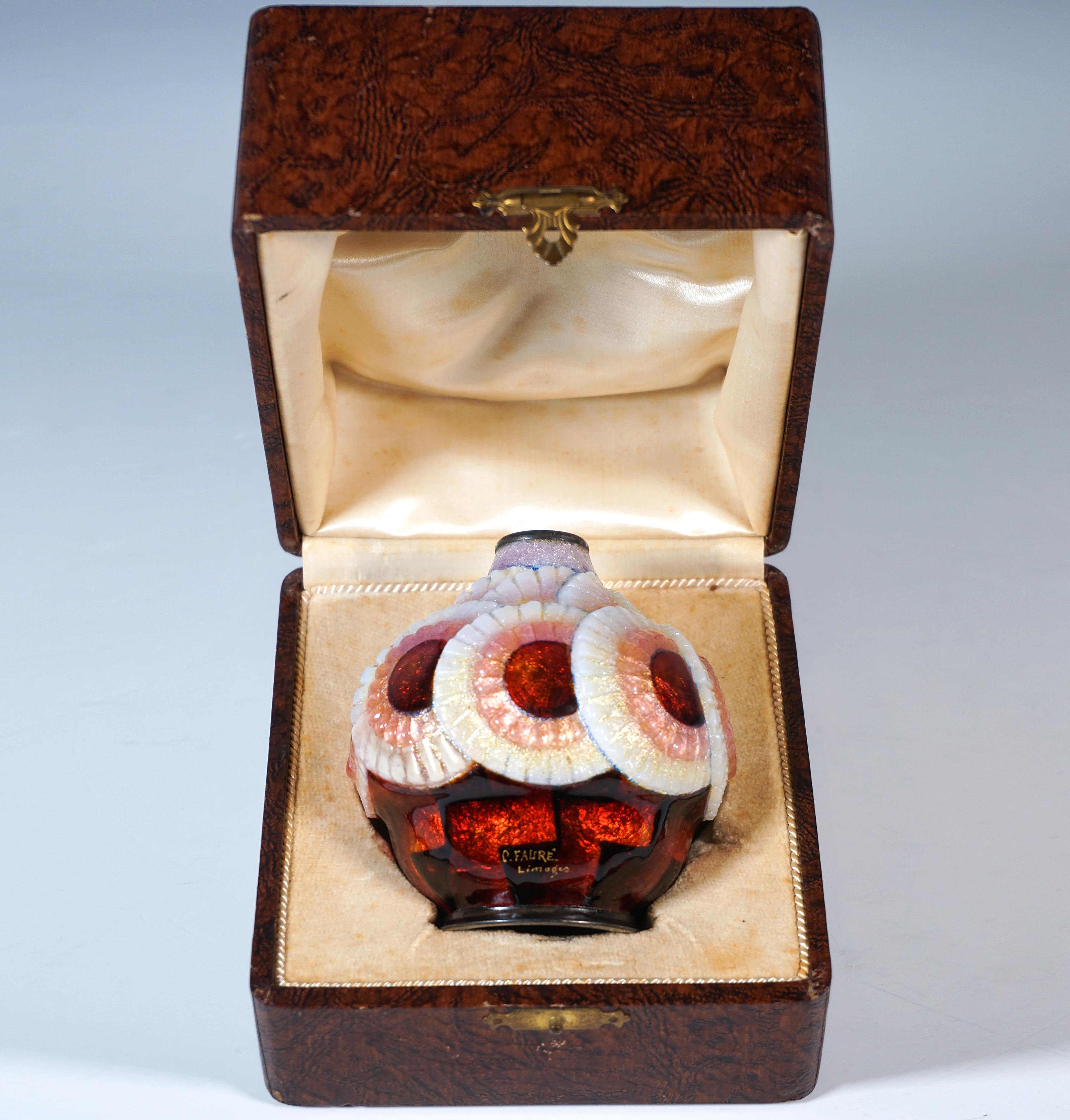 Spherical copper vessel on a round, fluted base, coated in silvery pink and decorated with partially pasty, polychrome and iridescent geometric and floral enamel in shades of white and red, partly smooth, partly 
irregular glazed with gold dust,