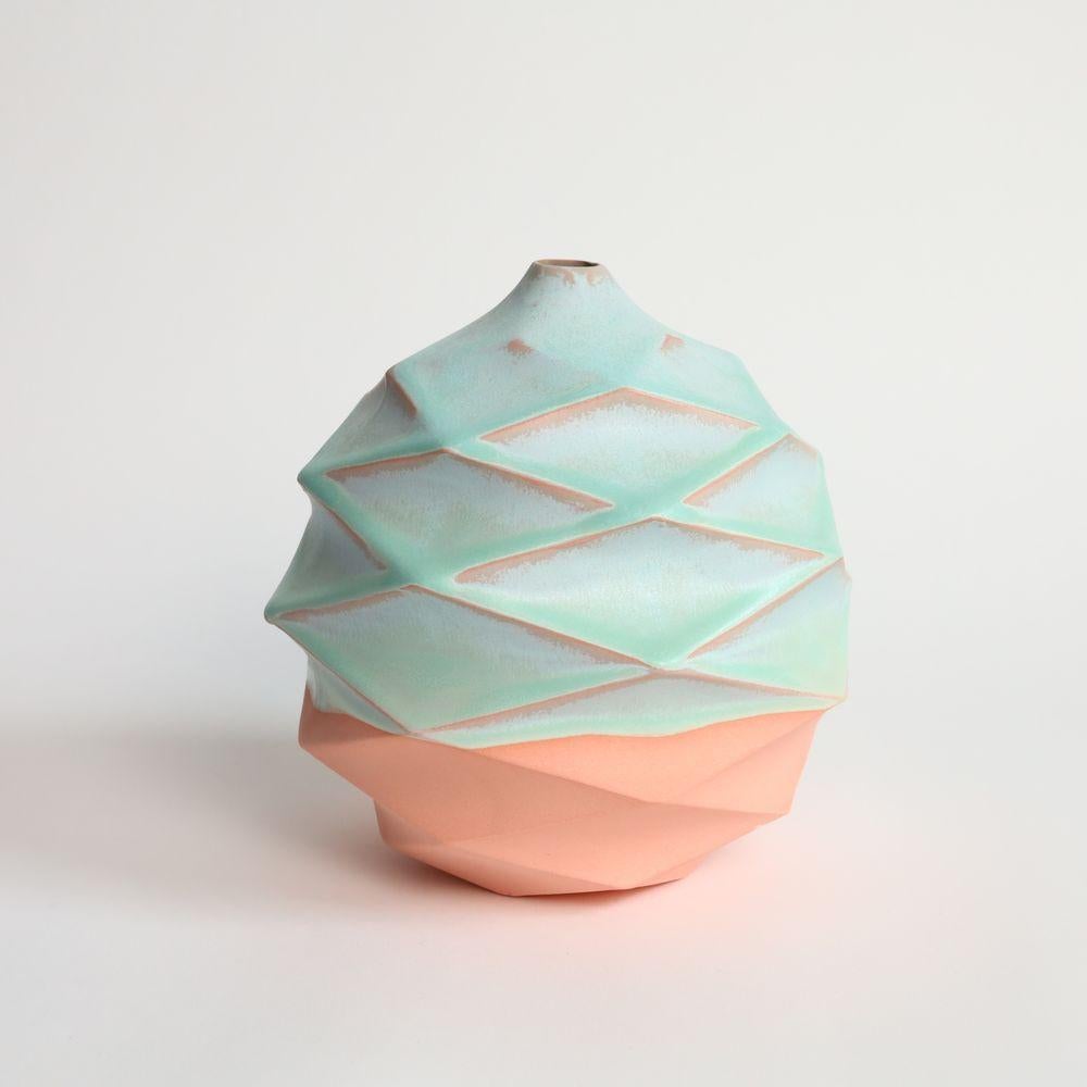 Spherical in Strawberry Pistachio
Spherical is round on the outside and hollowed on the inside. It is not a traditional vase but more a statement piece and cutting-edge design. After creating a perfect sphere shape, we decided to turn it inside-out