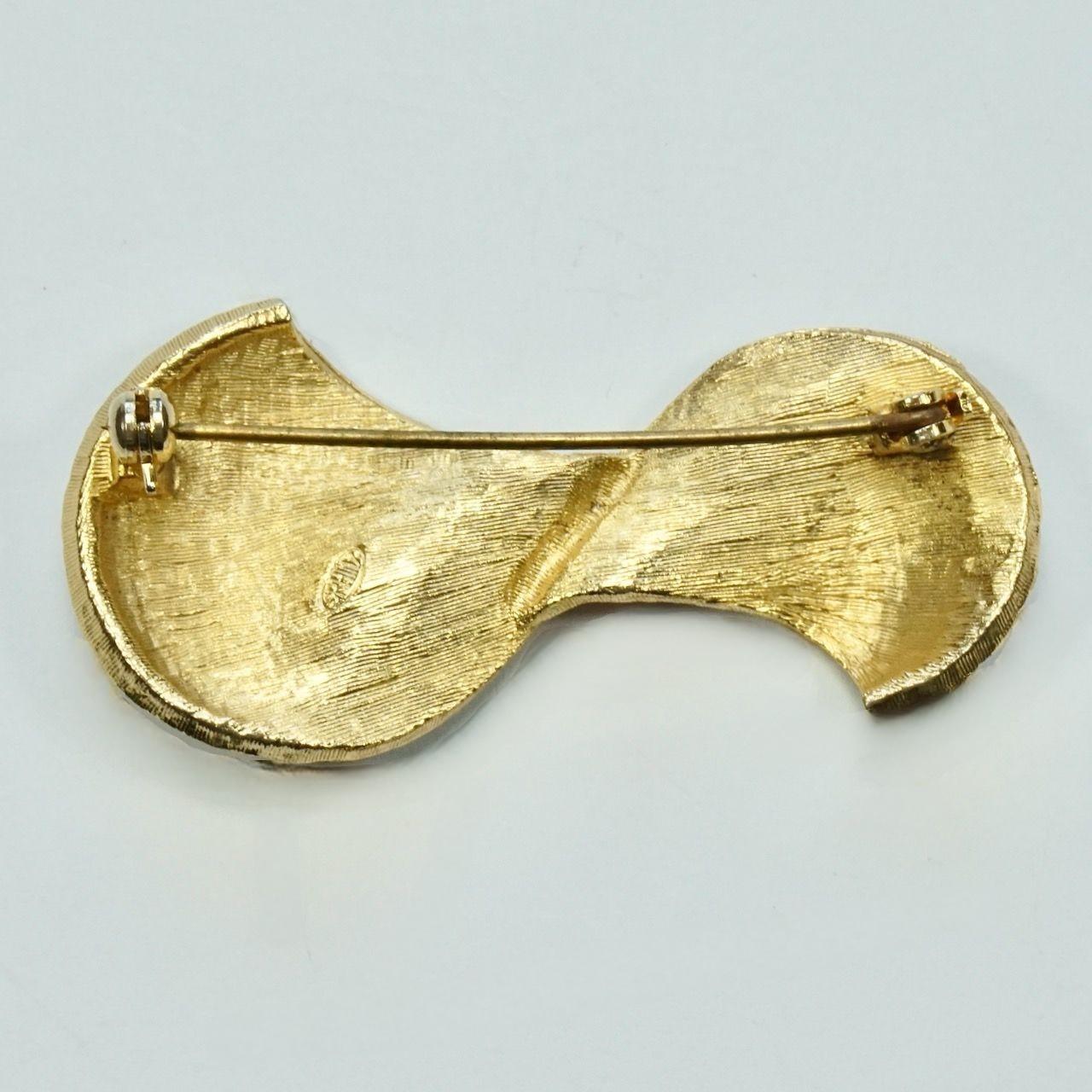 Sphinx Broche nœud abstrait en verre turquoise et plaqué or Unisexe en vente