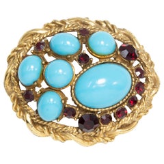 Sphinx Golden Turquoise Cabochon and Ruby Crystal Pin Brooch, Mid 1900s