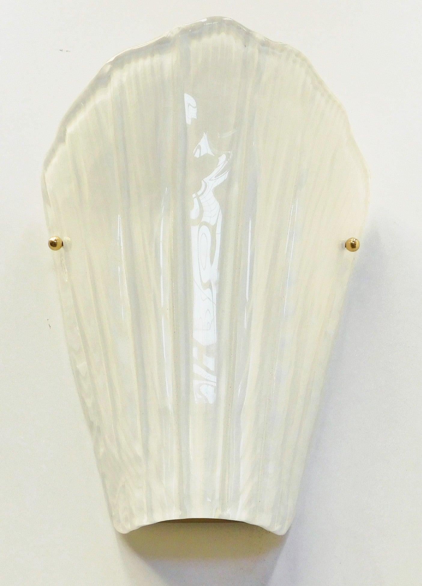 Italian wall light with white Murano glass molded into an artistic shell shape, mounted on polished finish brass frame / Designed by Fabio Bergomi for Fabio Ltd / Made in Italy
1 light / E12 or E14 type / max 40W each
Measures: Height 12.5 inches /