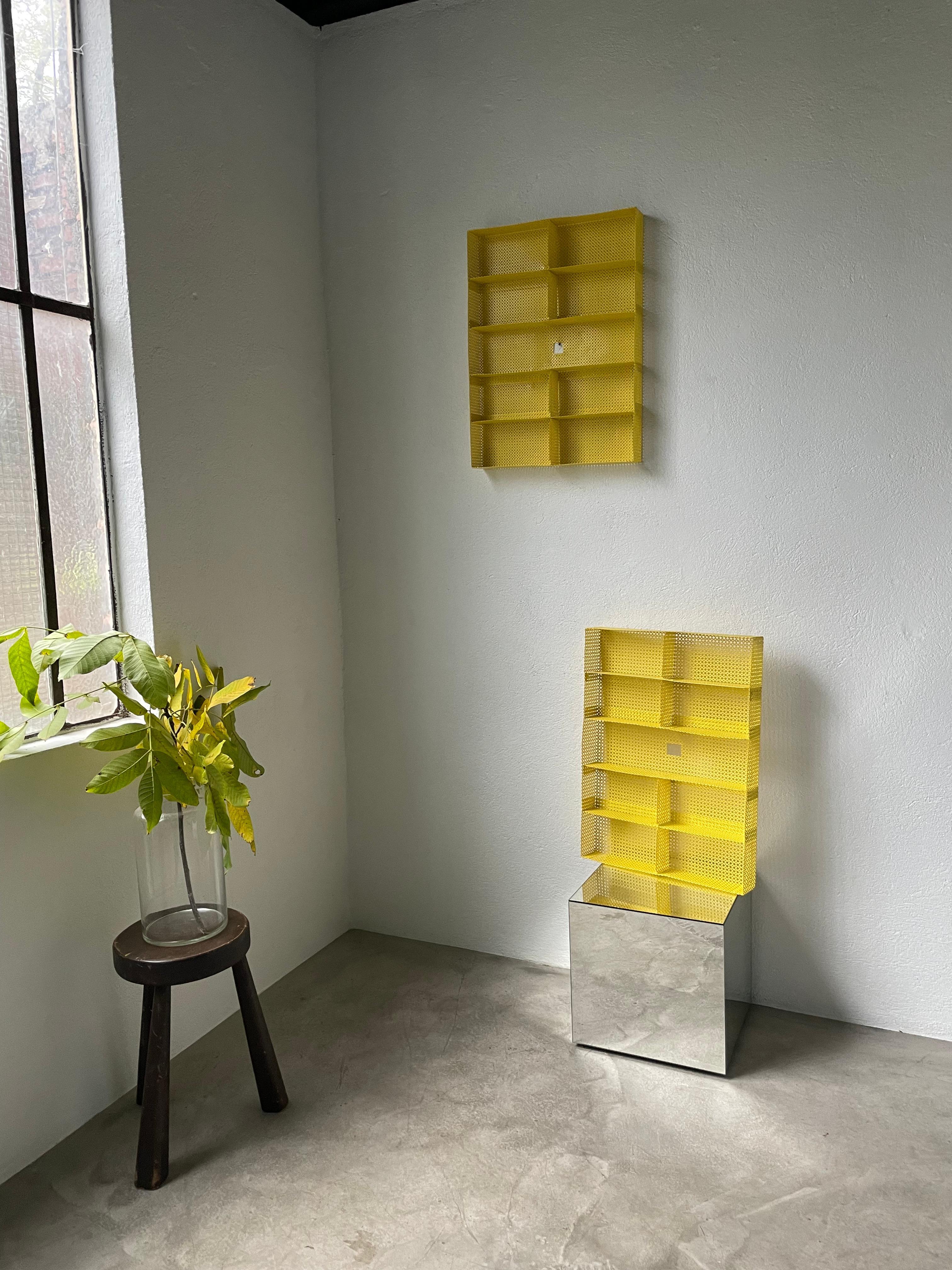 This spice rack duo is irresistible. Fully thermo-lacquered by us in glossy lemon yellow, these spice racks can also be used as wall storage for small accessories in a bedroom or office, adding an incredible boost of pep! Height 67.5 X width 50 X