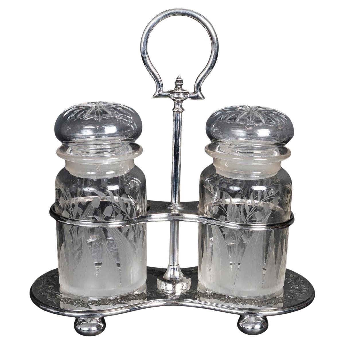 Juego de especias en metal plateado y cristal, S. XIX.