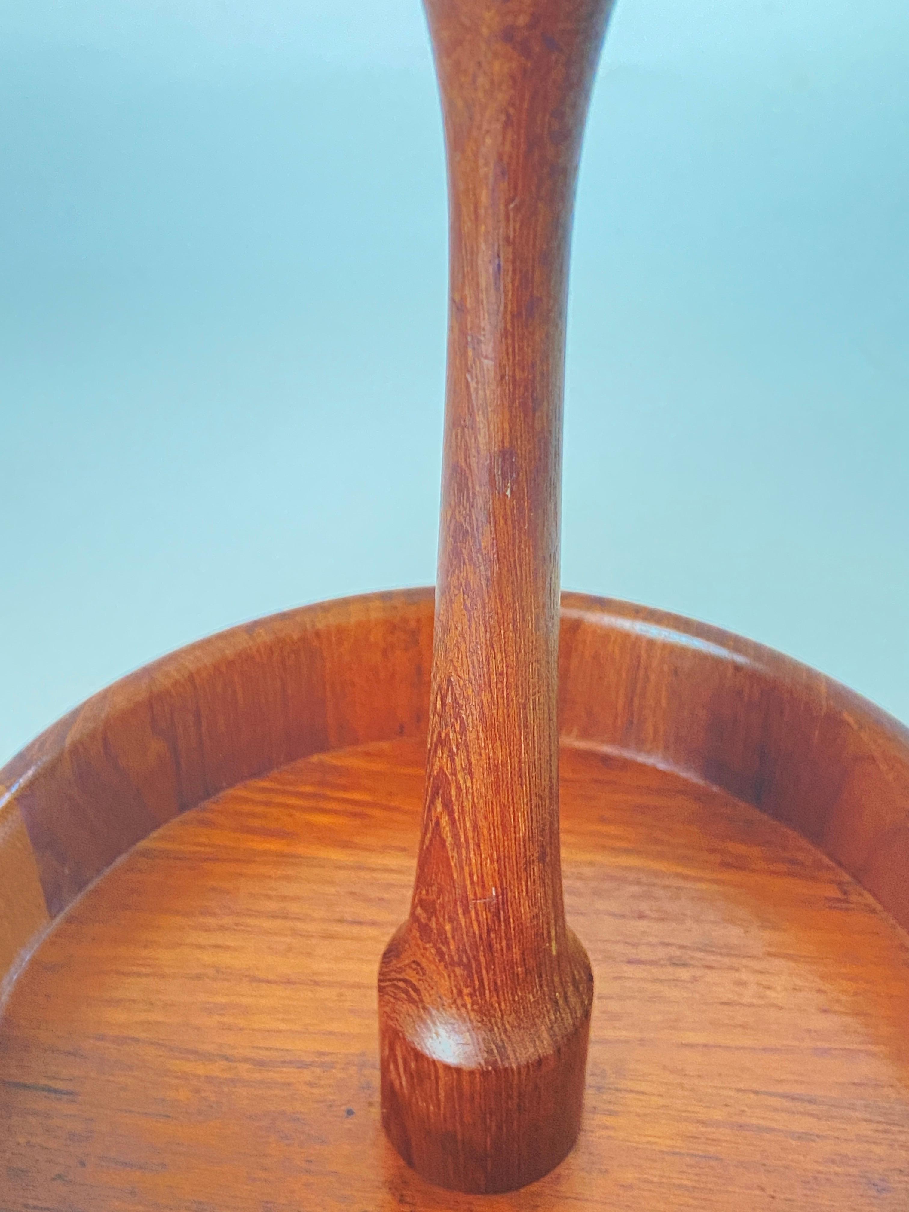 This Spice tray or platter is from Denmark. It has been made in the 1970s.
Brown Color.
With a Wooden Handle.