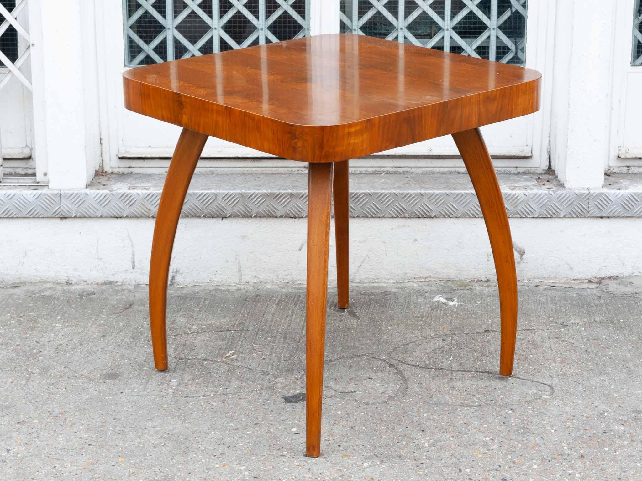 Art Deco 'Spider' walnut coffee or side table by Jindrich Halabala for Spojené UP Zavody. Produced in the 1930s in the former Czechoslovakia. Walnut veneered.
Model H259. In very good vintage condition.