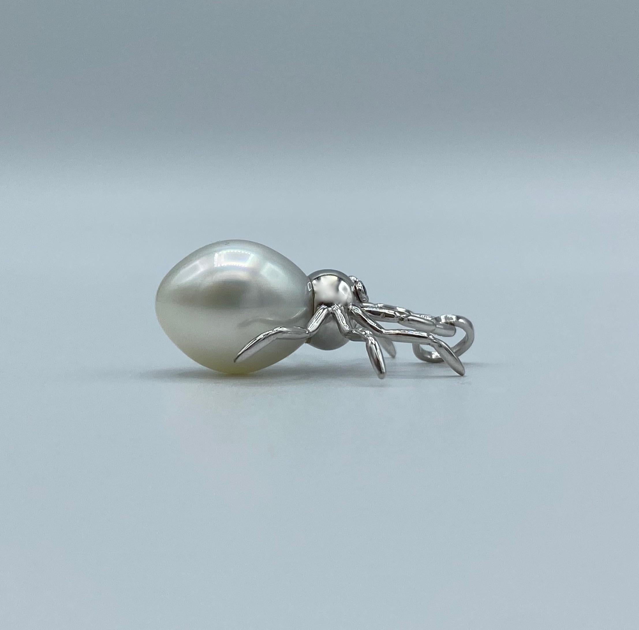 Spider Black Diamond Australian Pearl Gold Pendant or Necklace 
Pendant in white gold with an Australian pearl inspired by nature, more precisely, by a spider. It has two black diamond for its eyes, in total ct 0.02.
The pearl is mm 15x12, slightly