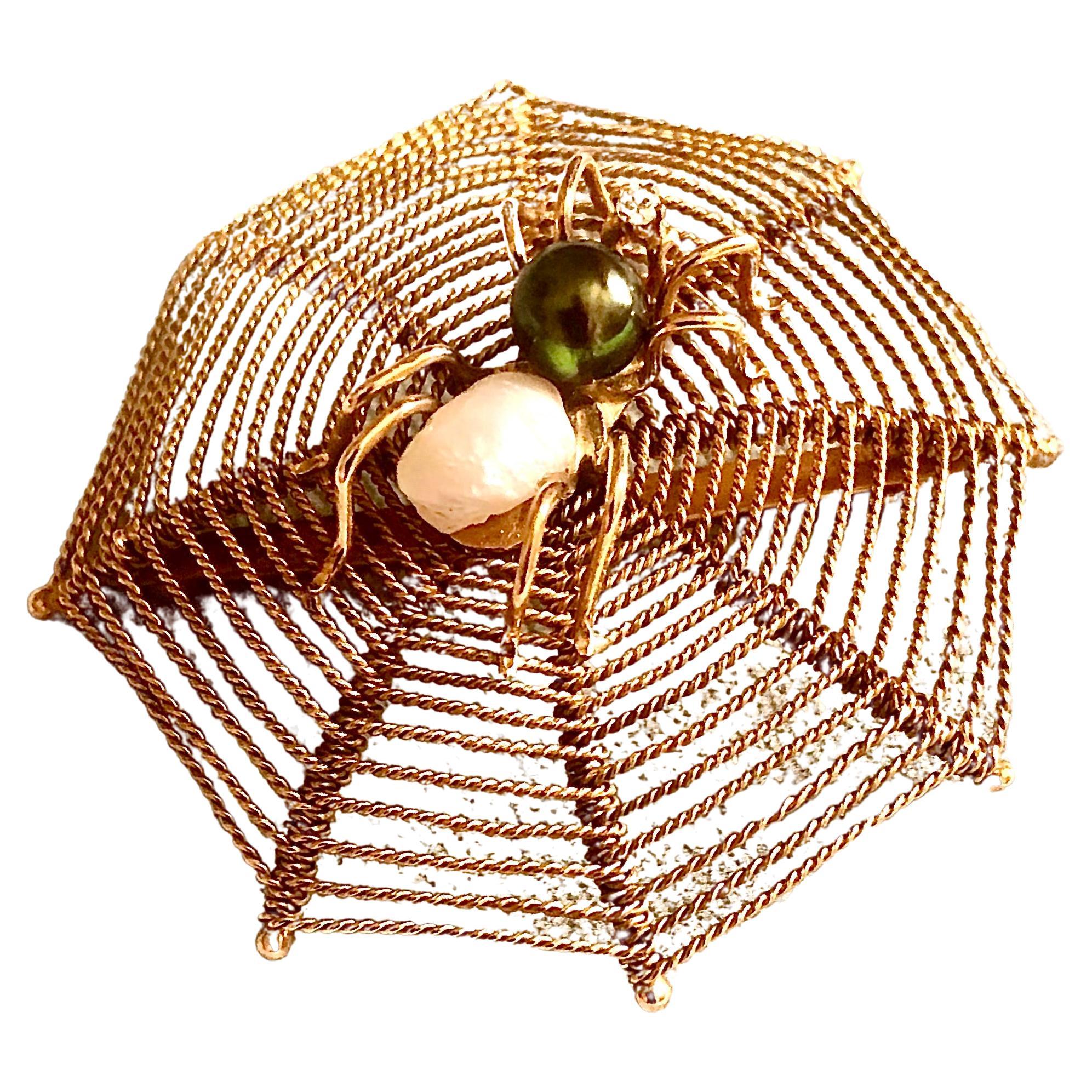 Spider web brooch