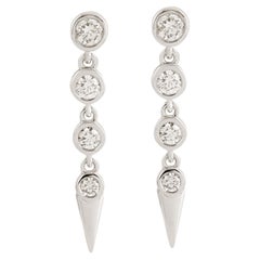 Pendientes colgantes con diseño de espiga y diamantes de oro blanco de 18 quilates