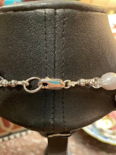 Spikes and pearls in a handmade, one of a kind.necklace from Lorraine’s Bijoux.]