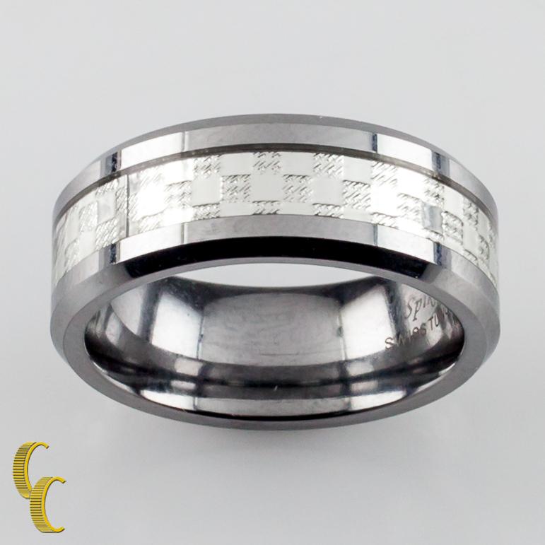 Tungsten carbide ring by Spikes-Tu.
Silver-colored checkerboard design.
Size: 8.25.
Width: 8 mm.
Weight: 11.6 grams.