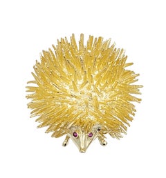 Spiky Round Hedgehog Brooch with Ruby Eyes Set in 14 Karat Yellow Gold