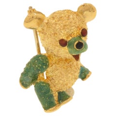 Spilla a forma di orso in oro con smalto