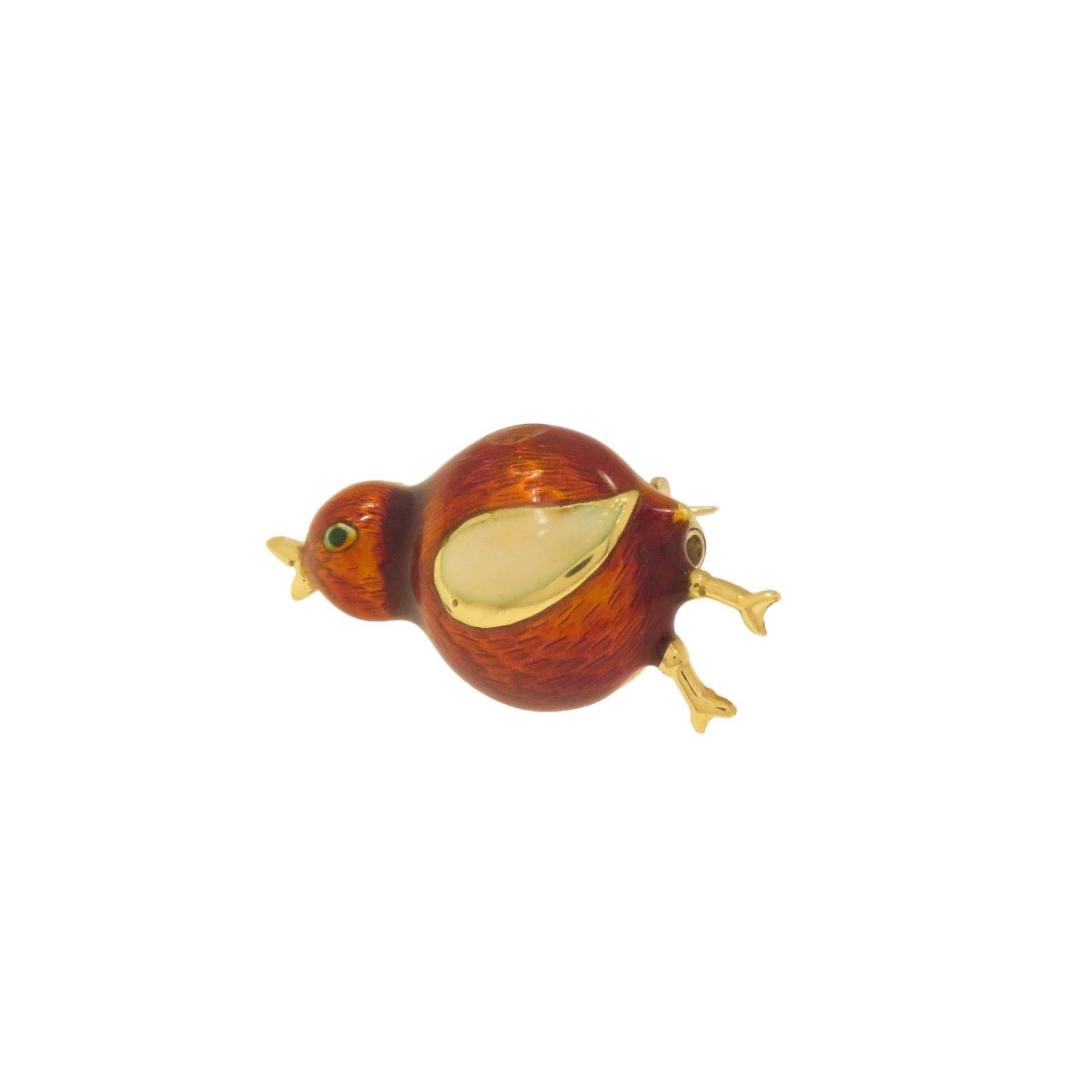 Pretty brooch depicting a chick handcrafted in 18K gold and fire enameled, produced between 1960 and 1970. The measurements of the brooch are 26x13 mm / 1.023x0.511 inches. The brooch has the 750 mark of 18K gold. The total weight is 4.4 grams.