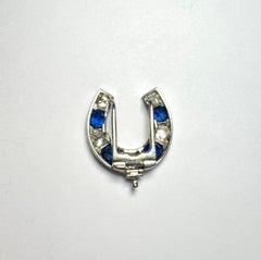 Cartier brooch in platinum with 4ct natural no heat sapphires and 3ct diamonds