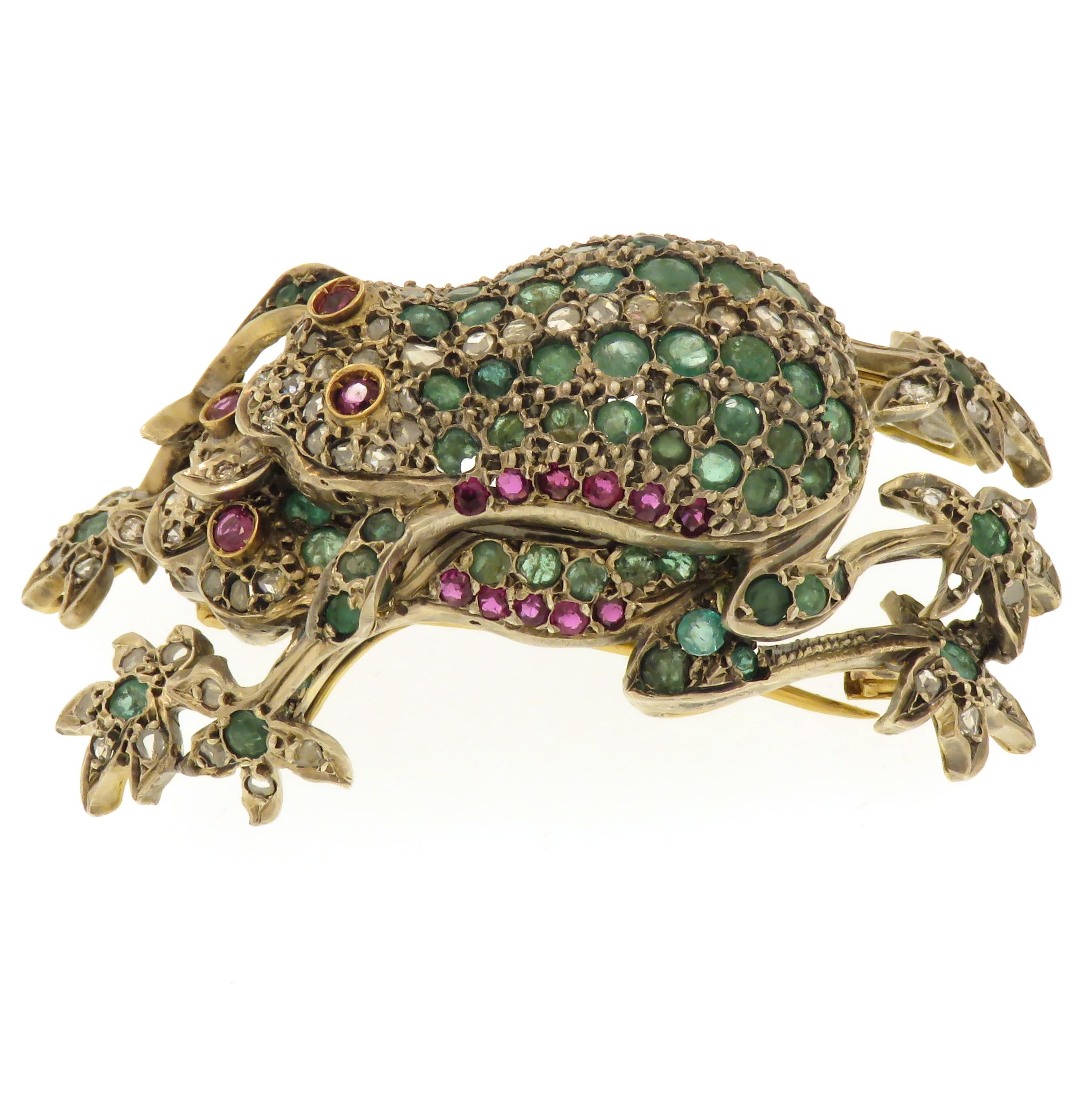 Round Cut Yellow Gold and Silver Brooch with Emeralds Diamonds and Rubies 1920 For Sale