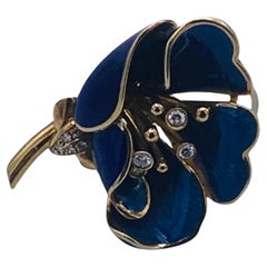 broche en or jaune et émail  et diamants