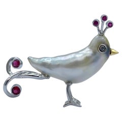 18Kt white gold Bird of Paradise brooch with Keshi diamond pearl and ruby