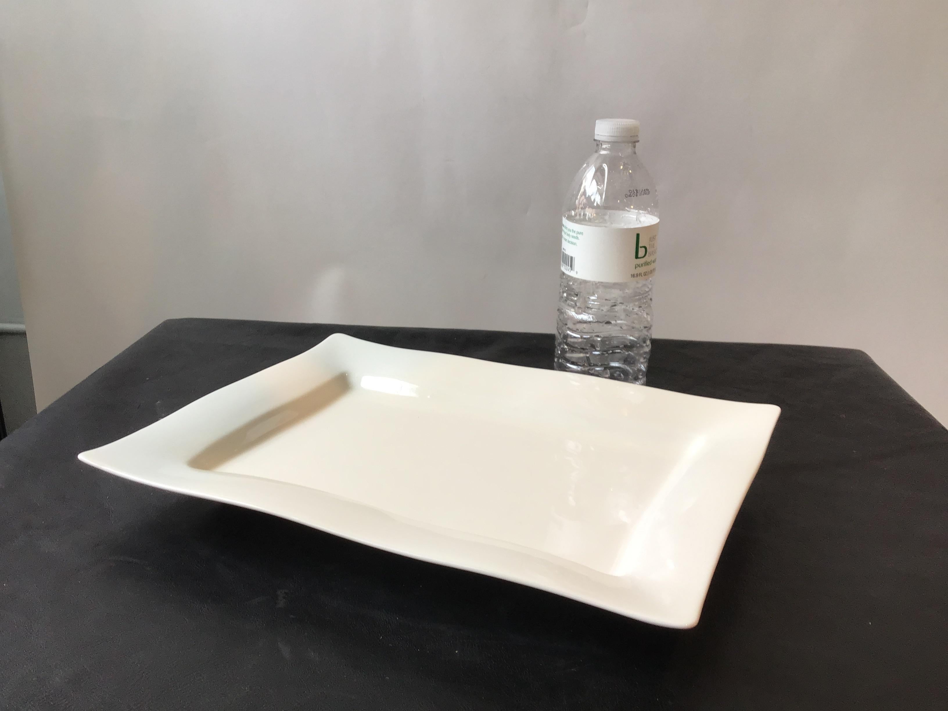 Spin ceramics serving plate. New.