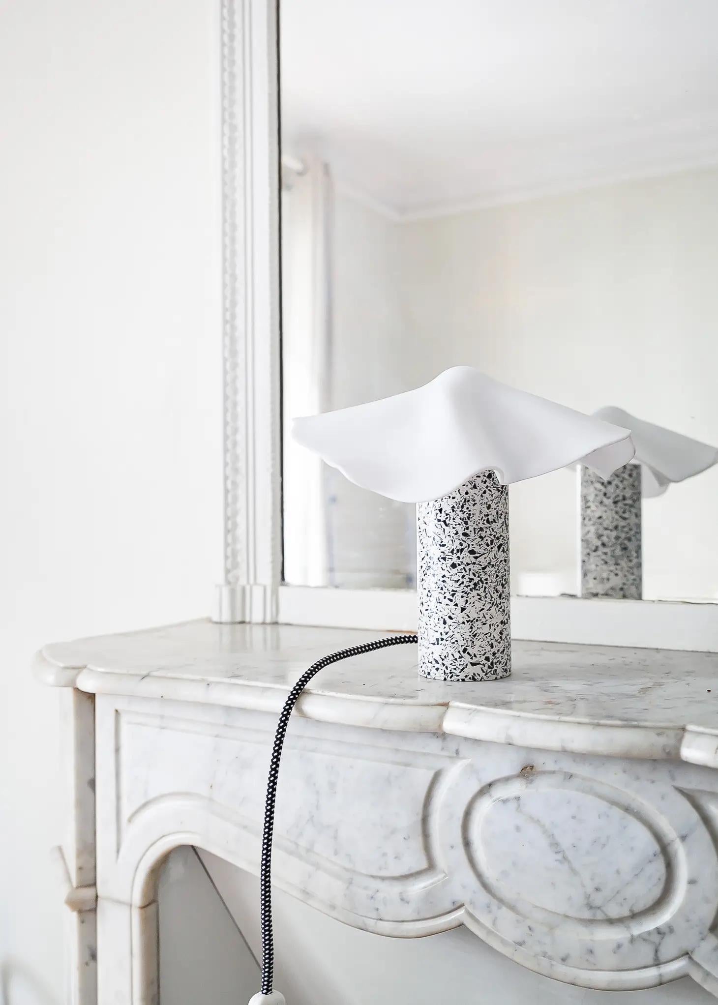 By Moodlight Studio

Table lamp with an astral aspect, spin-it hypnotizes thanks to its lampshade with airy curves. Simply balanced on the Led bulb, it twirls to the touch and makes the light dance on the walls.

Recycled Plastic:
Its terrazzo base